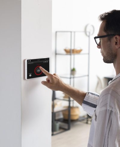 man-using-tablet-his-smart-home